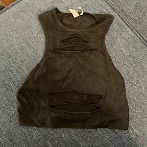 Out from under slashed shirt